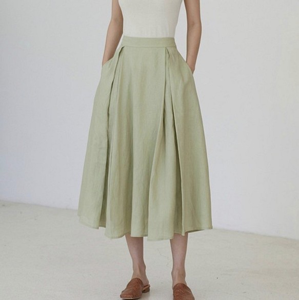 蘋果綠色 風的裙擺 優質亞麻 夏日背帶打褶半身裙 A字傘形短裙 第1張的照片