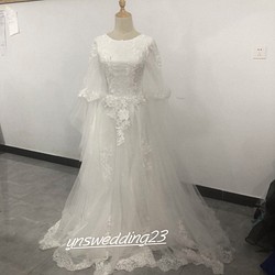 法式婚紗禮服白色精緻蕾絲短款拖地長裙人魚線條優雅透明 第1張的照片