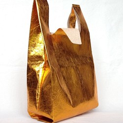 皮革黃金的方便袋M尺寸手提包 第1張的照片