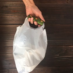 免費送貨牛皮綠色手柄蓋環保袋便利袋 第1張的照片