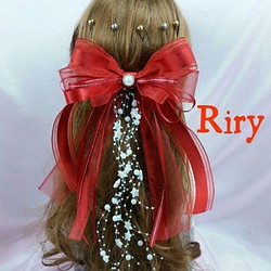 クリスマスイメージ　赤リボン　パールシャワー　スター 髪飾り ヘッドドレス ヘッドパーツ ヘッドアクセサリー 1枚目の画像