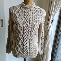 非対称模様のセーター 1枚目の画像
