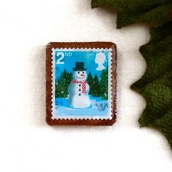 クリスマス切手ブローチ＊シルクハットを被った雪だるま＊イギリス 1枚目の画像