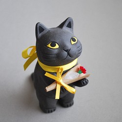 カーネーションを持った猫(黒猫)　母の日カーネーション2021 1枚目の画像