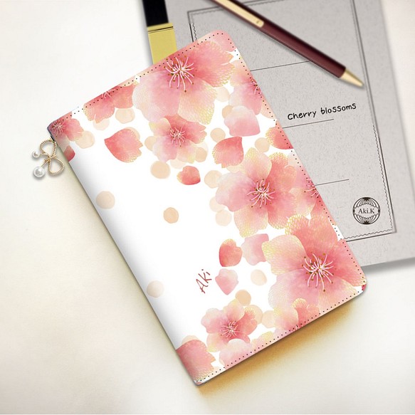 【名入れオーダー】桜のタブレットケース　Mサイズ　リボンチャーム付き 1枚目の画像