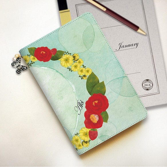 【名入れオーダー】1月　誕生花のタブレットケース　Mサイズ　蝶チャーム付き 1枚目の画像