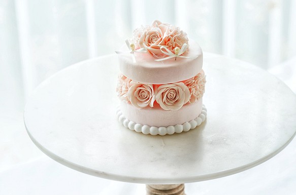 乳粉色花蛋糕環枕 第1張的照片