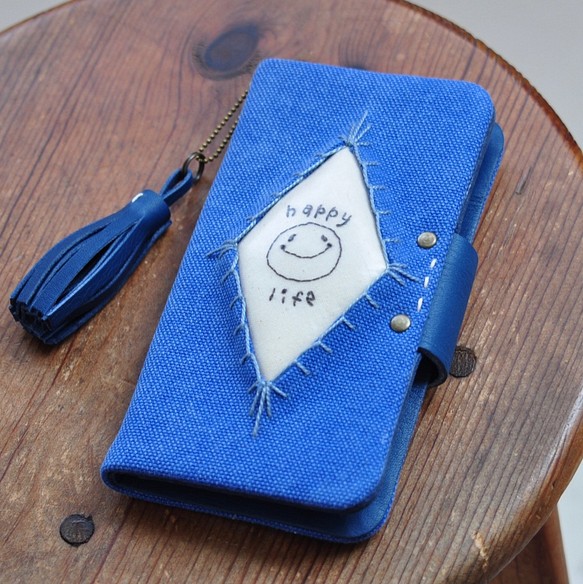 更新iphone復古藍色帆布×真皮筆記本型智能手機案例微笑訂單生產Niko陳 第1張的照片
