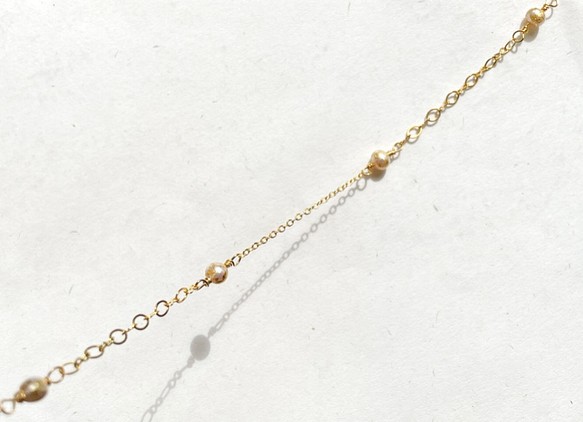 金箔淡水真珠のネックレスとブレスレット 1枚目の画像