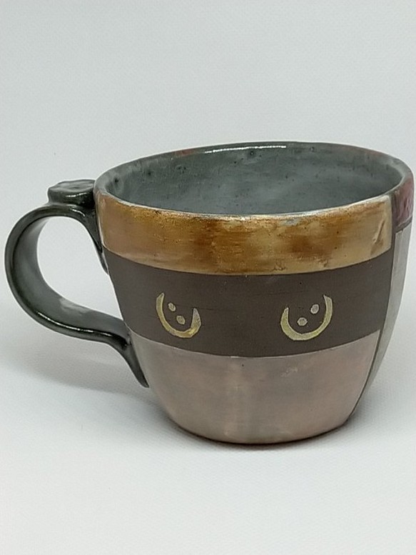 猫目のコーヒーカップ 1枚目の画像