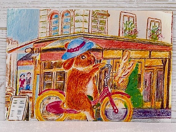 [うさぎ、パリの街並みを自転車に乗ってお買い物]同柄ポストカード3枚セット 1枚目の画像