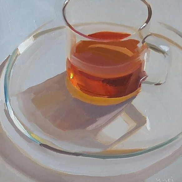 Tea Cup on Clear Glass Plate