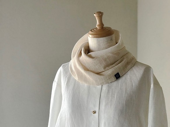 蓬鬆的棉絲紗布撚線圍裙面板圖案自然米色 第1張的照片