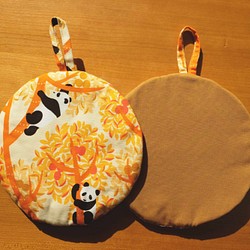 熊貓花樣的隔熱墊 橙色 第1張的照片