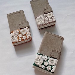 手帳型　コーディロイのチュール刺繍リボン iPhoneケース 1枚目の画像