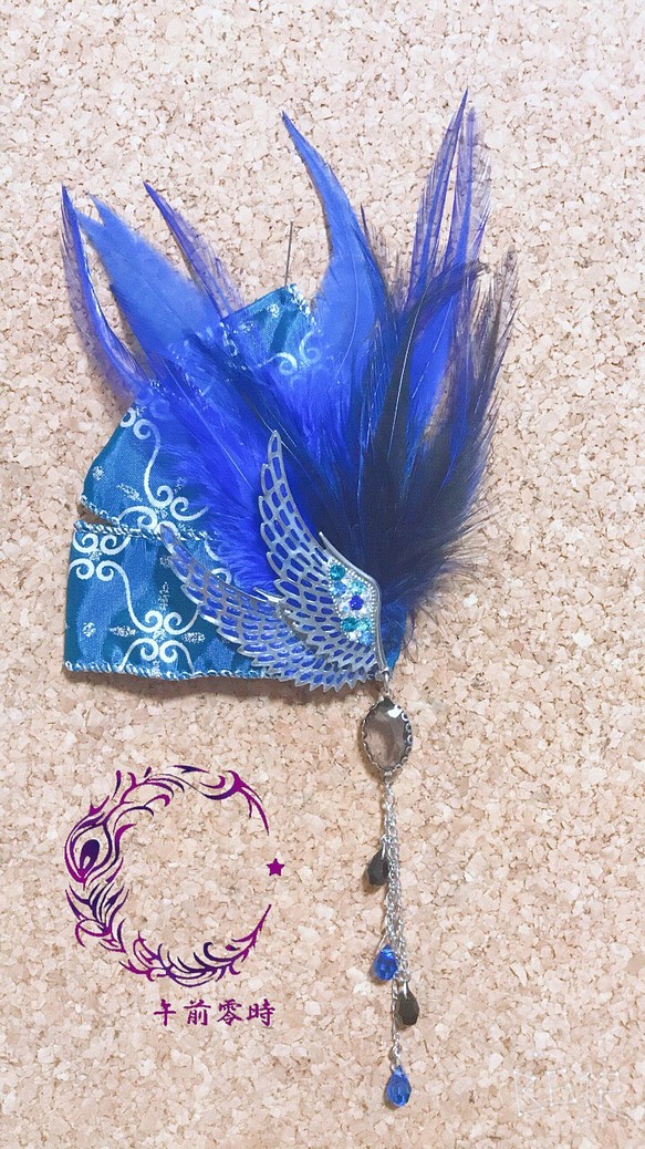 宝石羽根のヘアアクセサリ 1枚目の画像