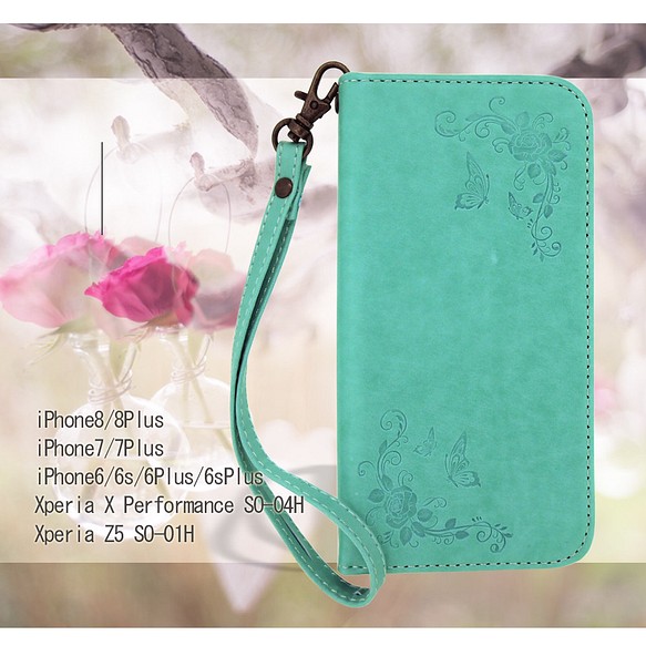 型押しバンドレス　ミント　シンプル　綺麗　蝶々デザイン iPhone 1枚目の画像