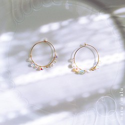 :the path of the wind: 14kgf hoop earrings transparent beads 第1張的照片