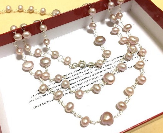 Silver 925ピンク淡水真珠のロングネックレス 1枚目の画像