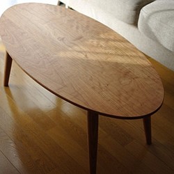 チェリー材のオーバルローテーブル 1枚目の画像