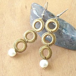 Tuoya耳環“戒指和珍珠”金 第1張的照片