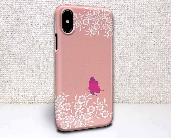送料無料 iPhoneケース・カバー ピンクの花畑と蝶 花柄 iPhone12 mini iPhone12 Pro 1枚目の画像