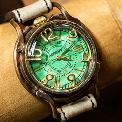 緑青で森をイメージした色鮮やかな文字盤の腕時計(Patrice Forest/在庫品) 1枚目の画像