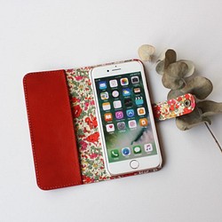 [適用於iphone5、5S，SE]帶有牛皮和自由印花紅色的iPhone護套 第1張的照片